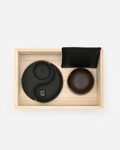 Lower portion of tiered Nezen Box Set by Iwata on a white background