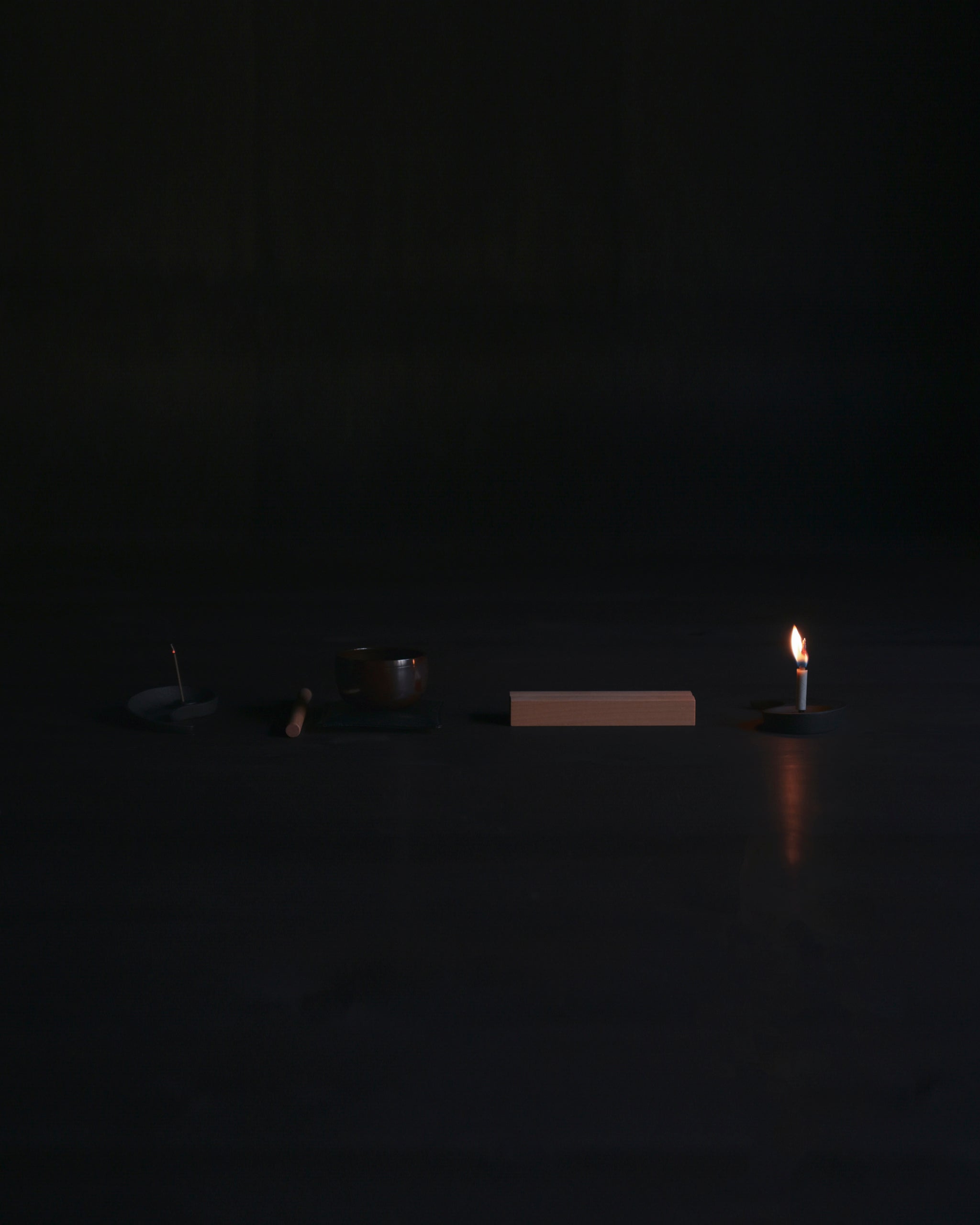 Nezen Box Set by Iwata lined up on the floor on a Black background