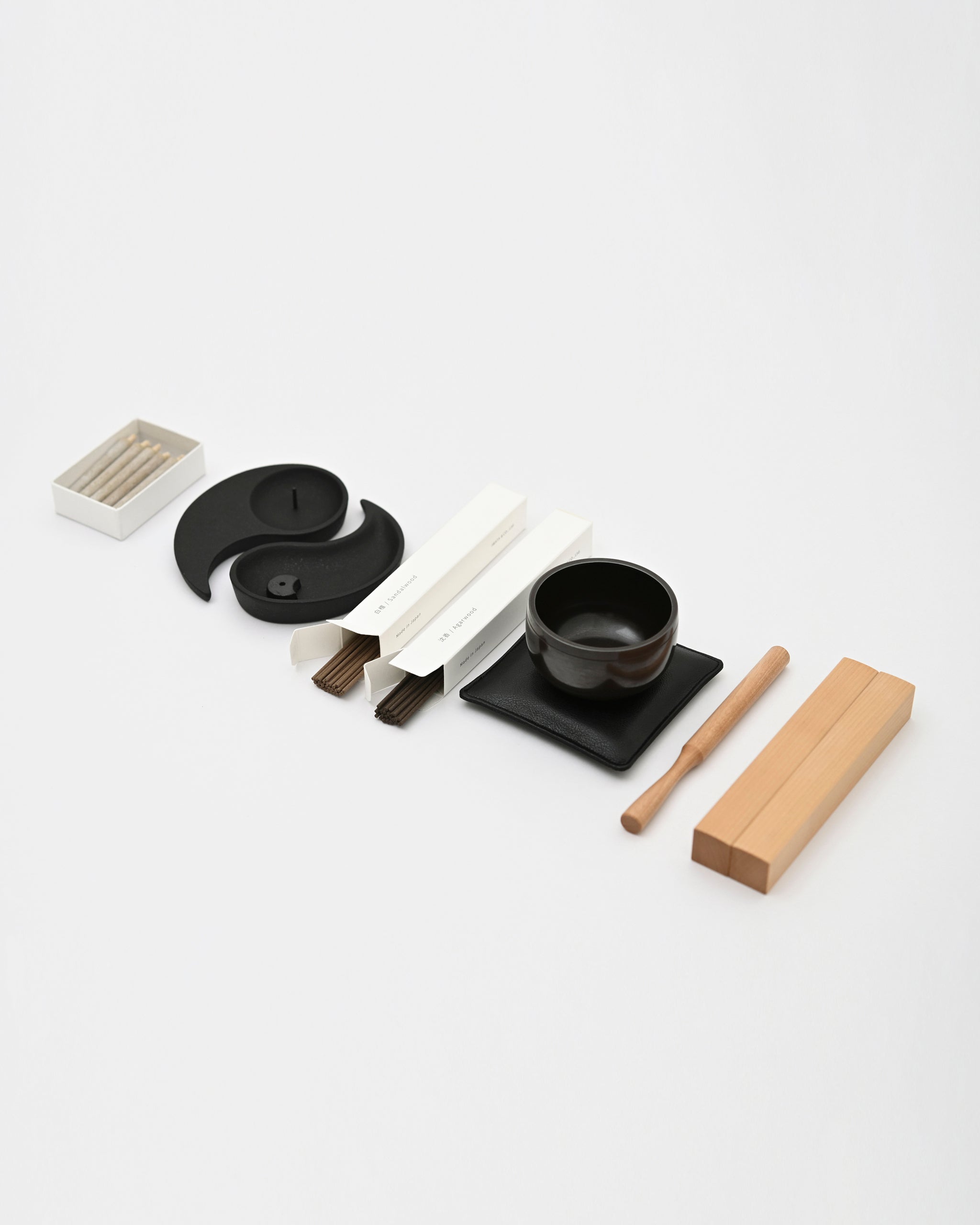 Contents of Nezen Box Set by Iwata lined up on a white background