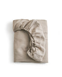 Unbleached linen fitted sheet by Iwata on a white background