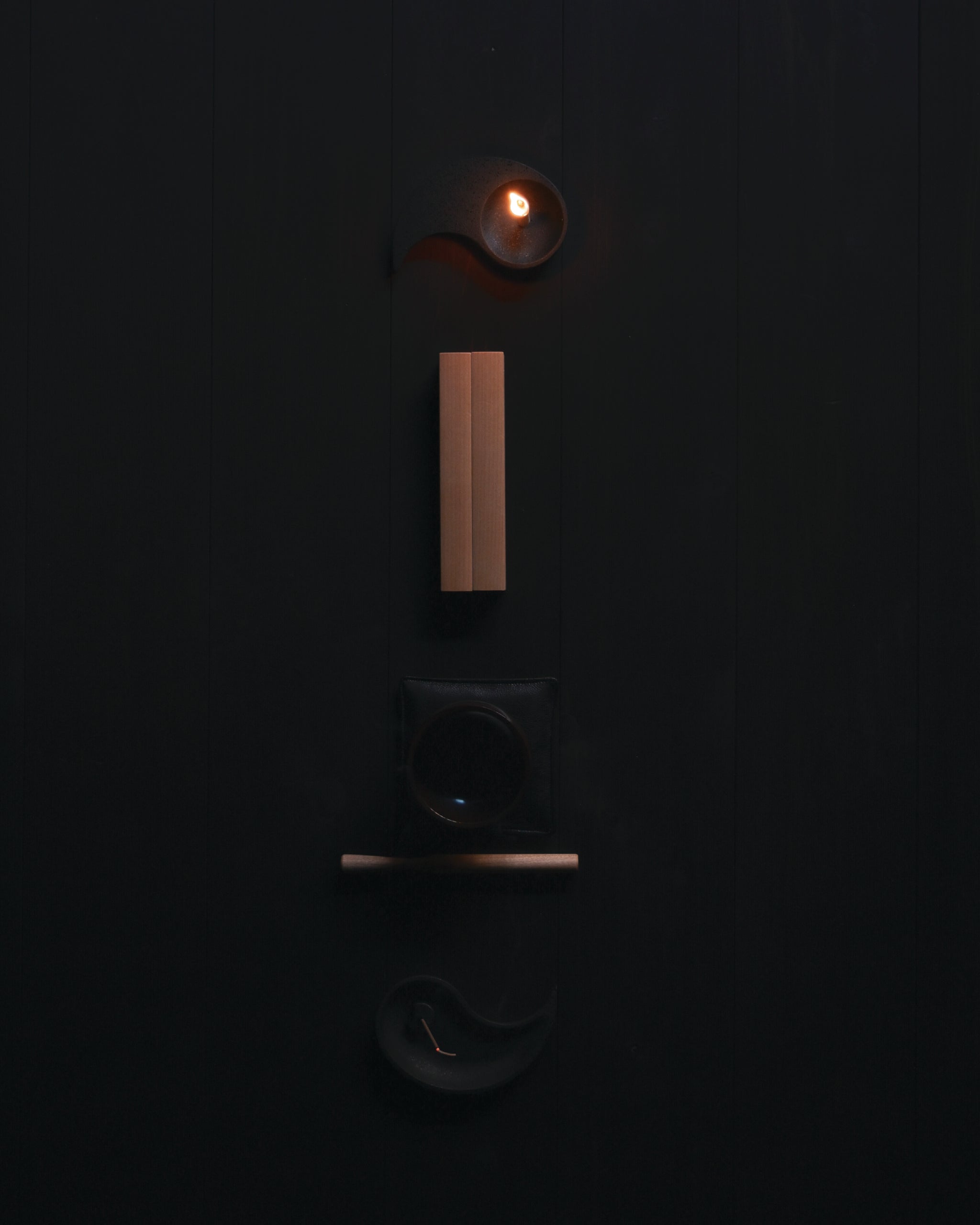 Nezen Box Set by Iwata lined up on the floor on a Black background