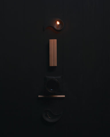 Nezen Box Set by Iwata lined up on the floor on a Black background