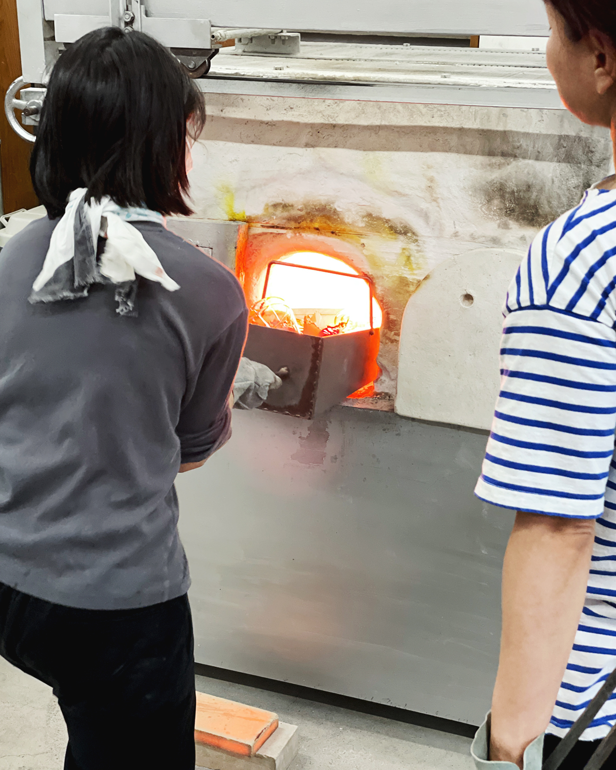Kazumi Tsuji and staff blowing glass