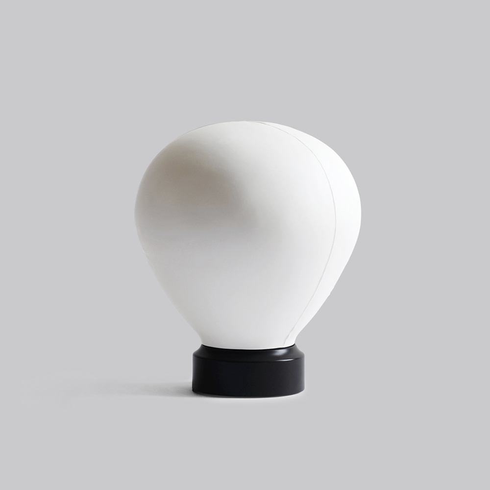 Hot air balloon-shape, smooth table lamp by Tobimatsu Toki with a black base on a gray background