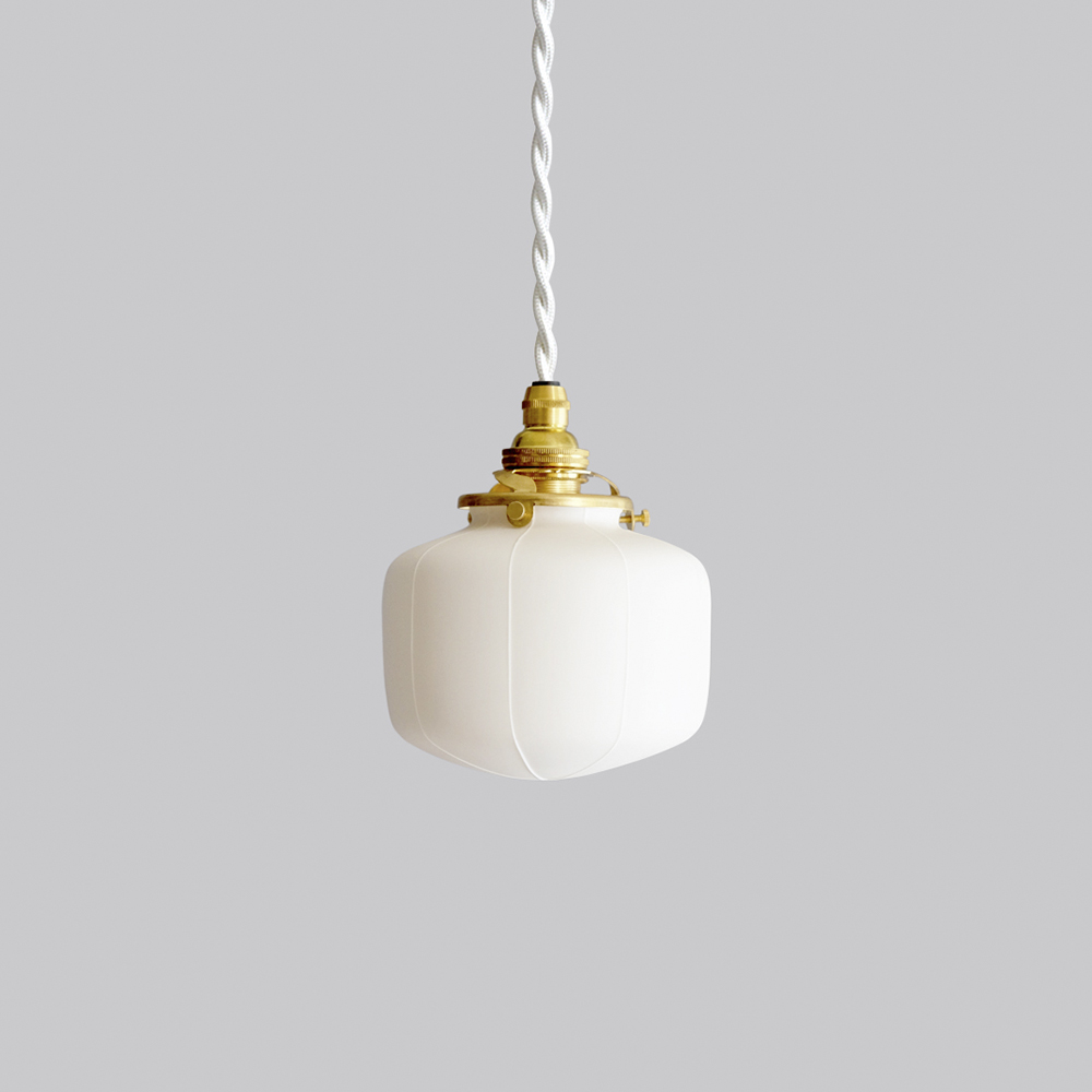 Hanging round, smooth pendant lamp by Tobimatsu Toki on a gray background