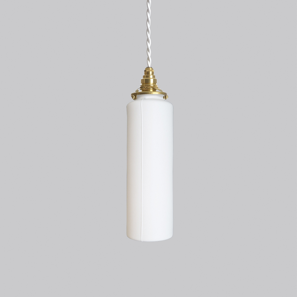 Hanging cylindrical, smooth pendant lamp by Tobimatsu Toki on a gray background