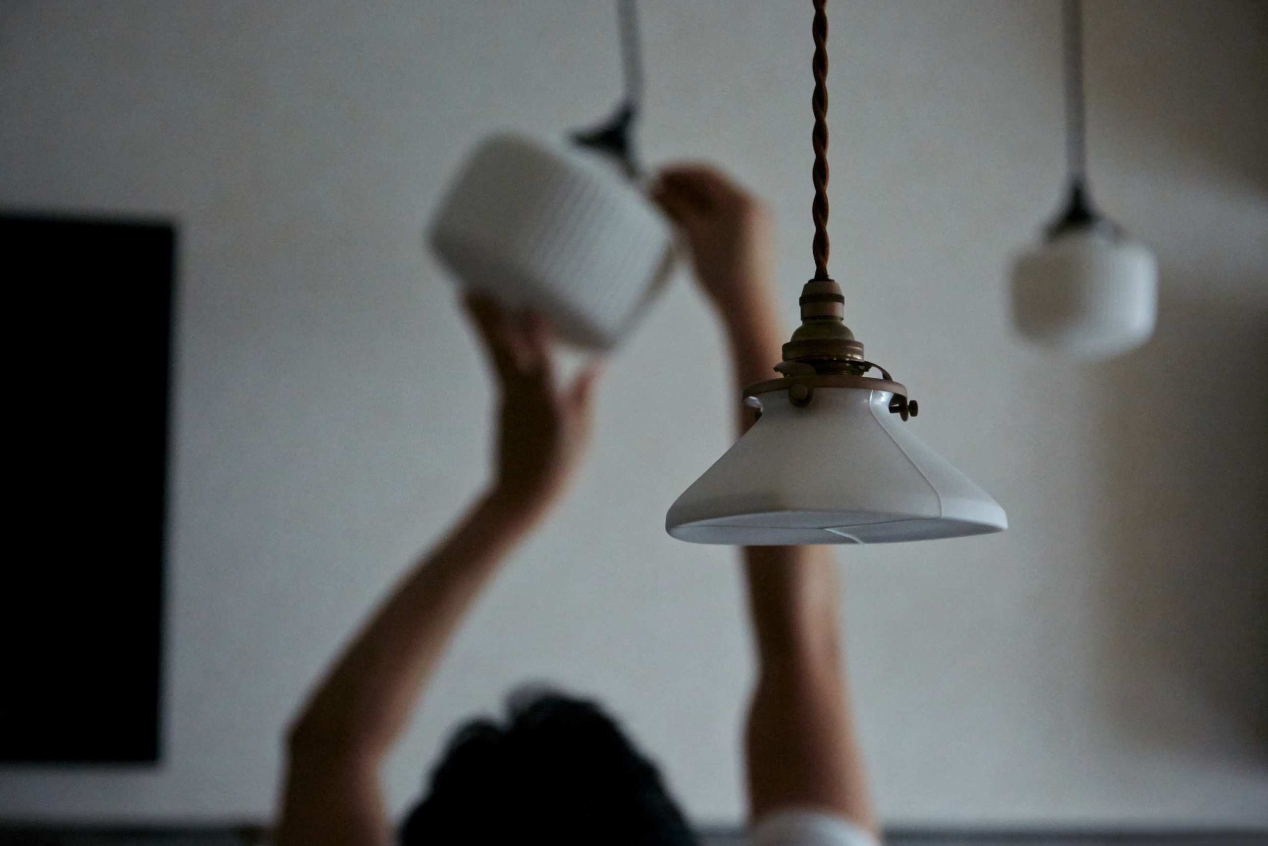 Hirotaka Tobimatsu hanging and wiring porcelain pendants