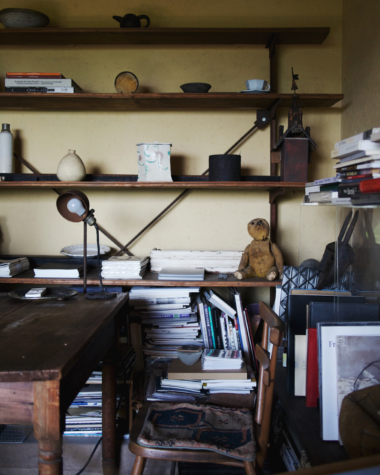 Shelves of personal antiques and objects at Keisuke Iwata's home