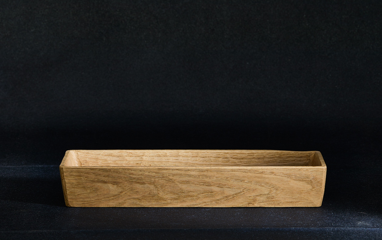 Ryuji Mitani wooden rectangular container against dark background