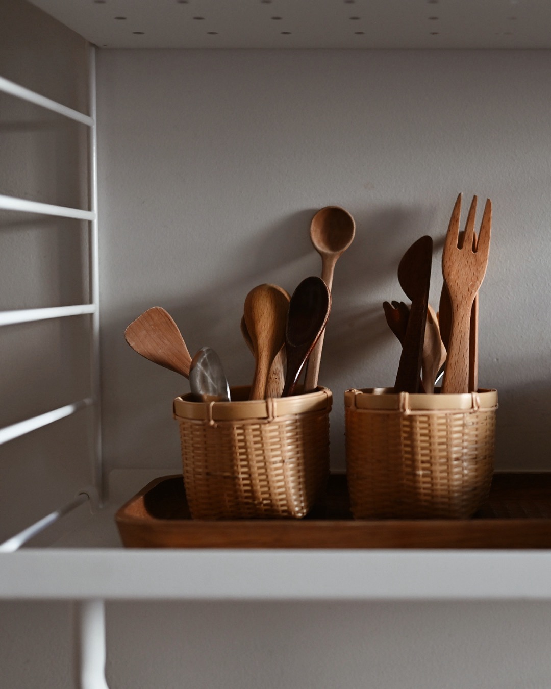 wooden cutlery in mini round baskets