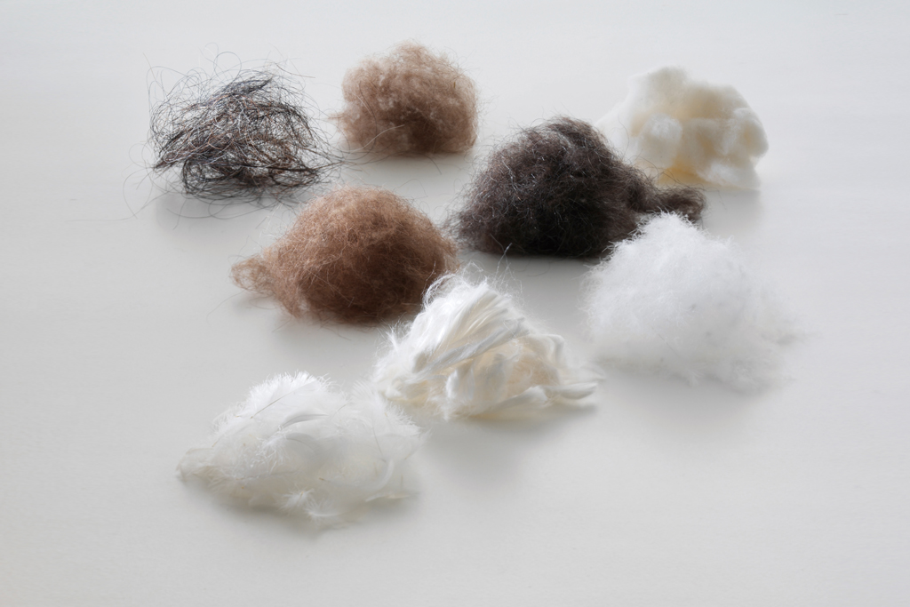 Materials and fibers by Iwata on a gray background